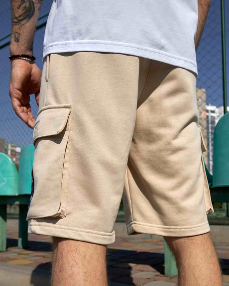 Шорти бежеві з нашивками 831 БрТА