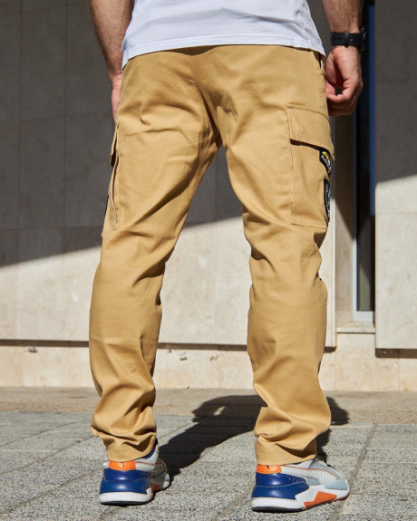 Штани карго бежеві з нашивками 831 БрТА Штани карго бежеві з нашивками 831 БрТА